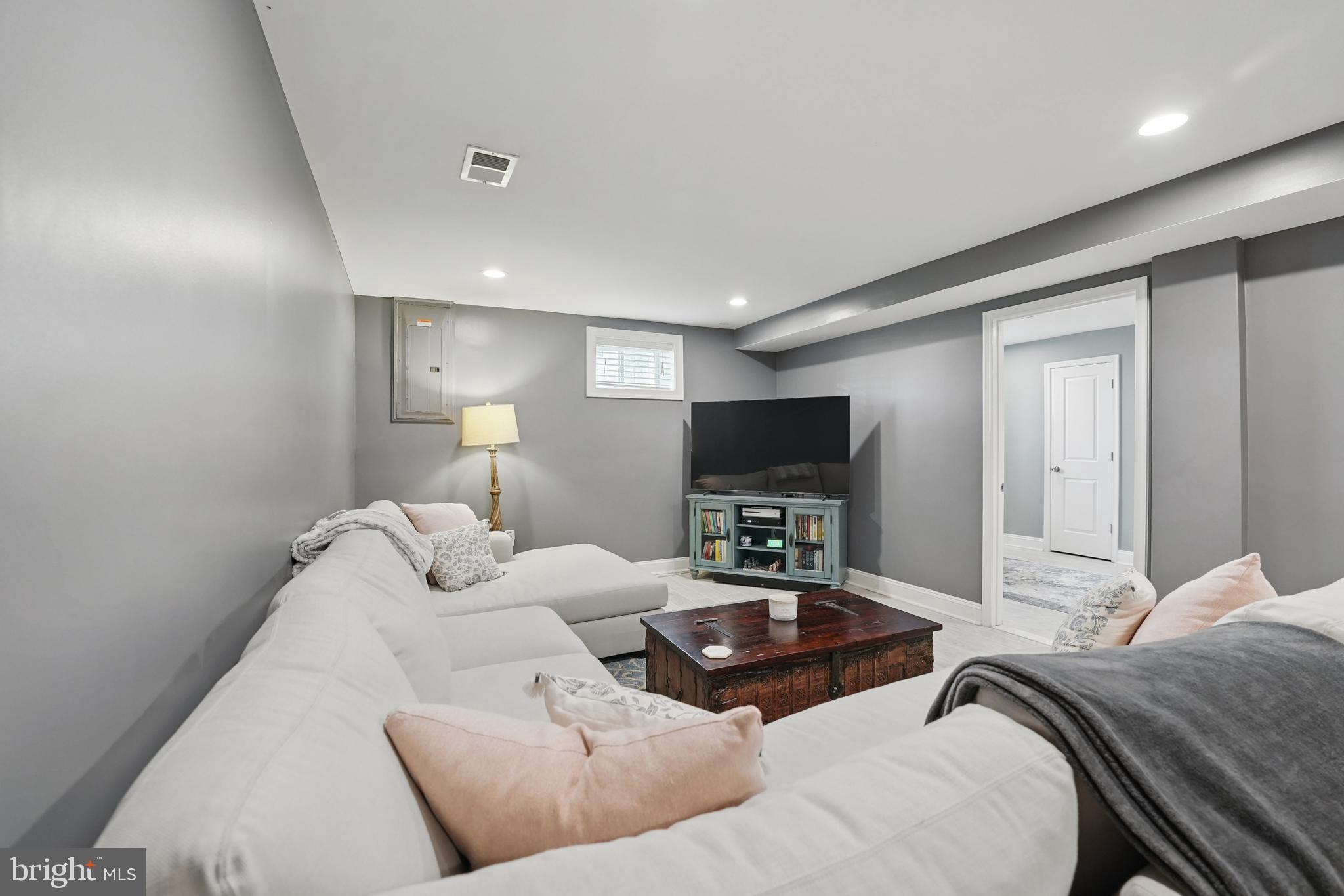 6930 27th Road North Arlington, VA 22213 - Photo 34 of 51 a bedroom with furniture and a flat screen tv