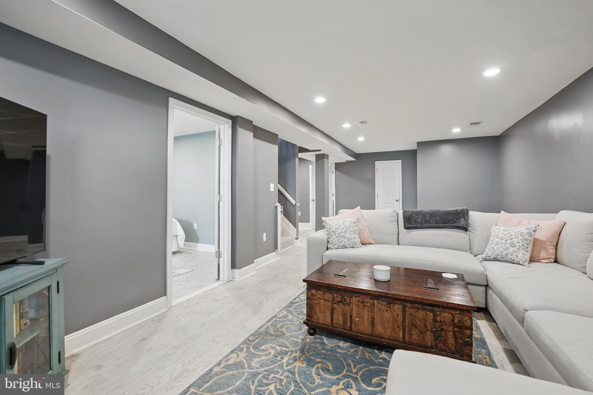 6930 27th Road North Arlington, VA 22213 - Photo 35 of 51 a living room with furniture and a flat screen tv