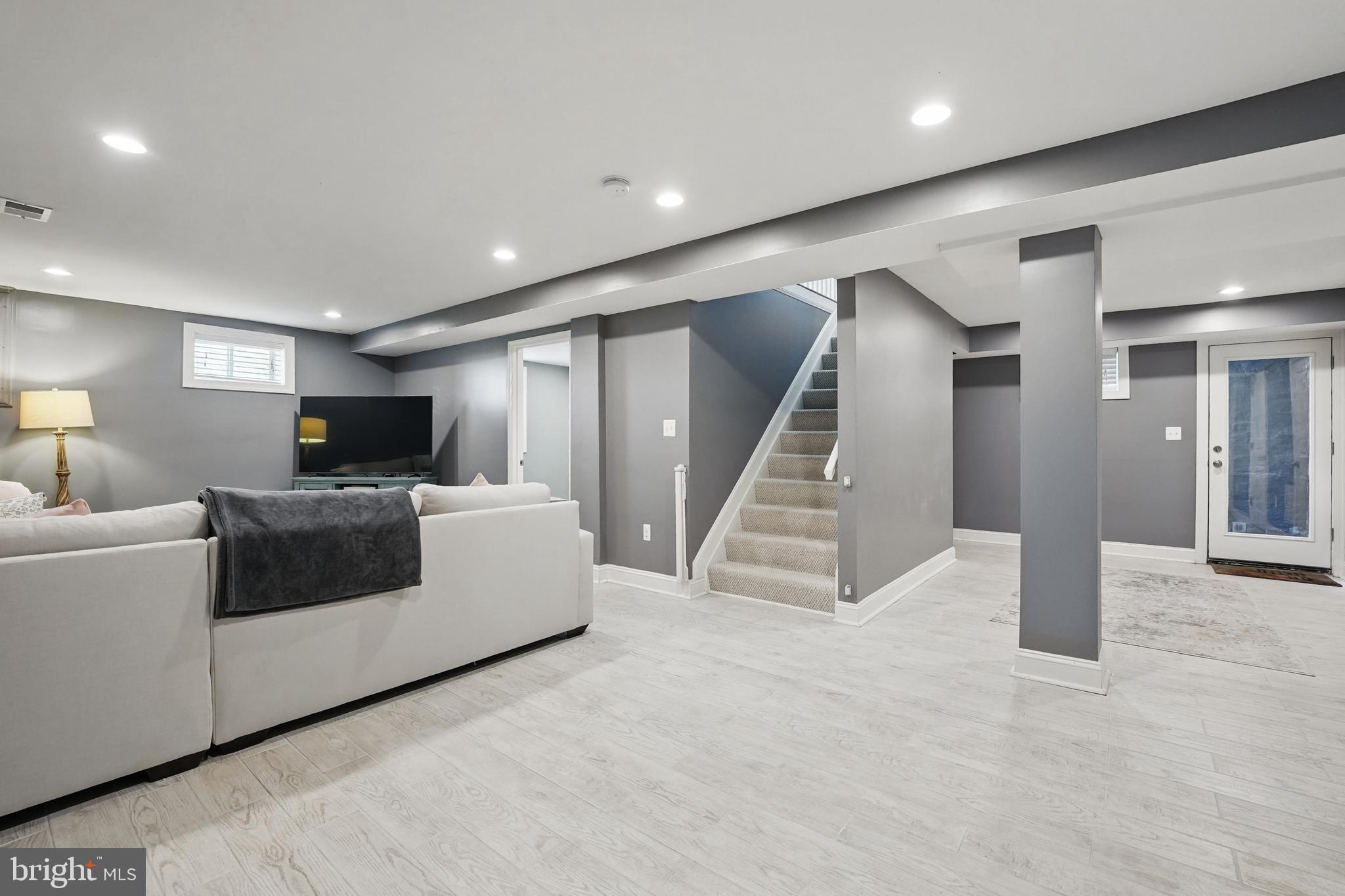 6930 27th Road North Arlington, VA 22213 - Photo 36 of 51 a living room with furniture and a flat screen tv