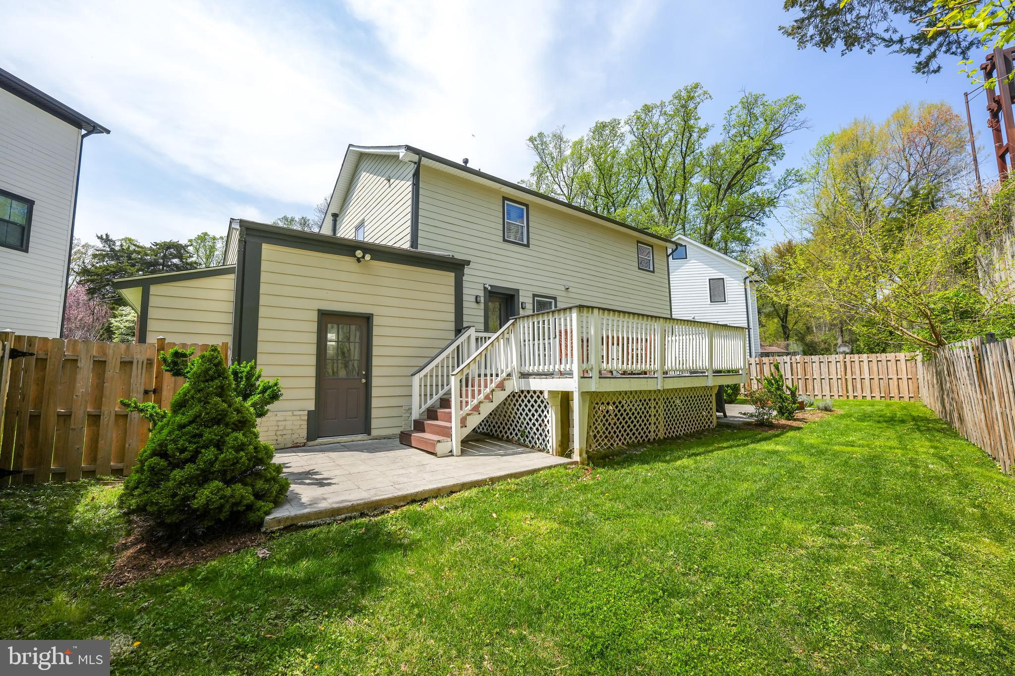 6930 27th Road North Arlington, VA 22213 - Photo 50 of 51 a view of a house with a yard and plants