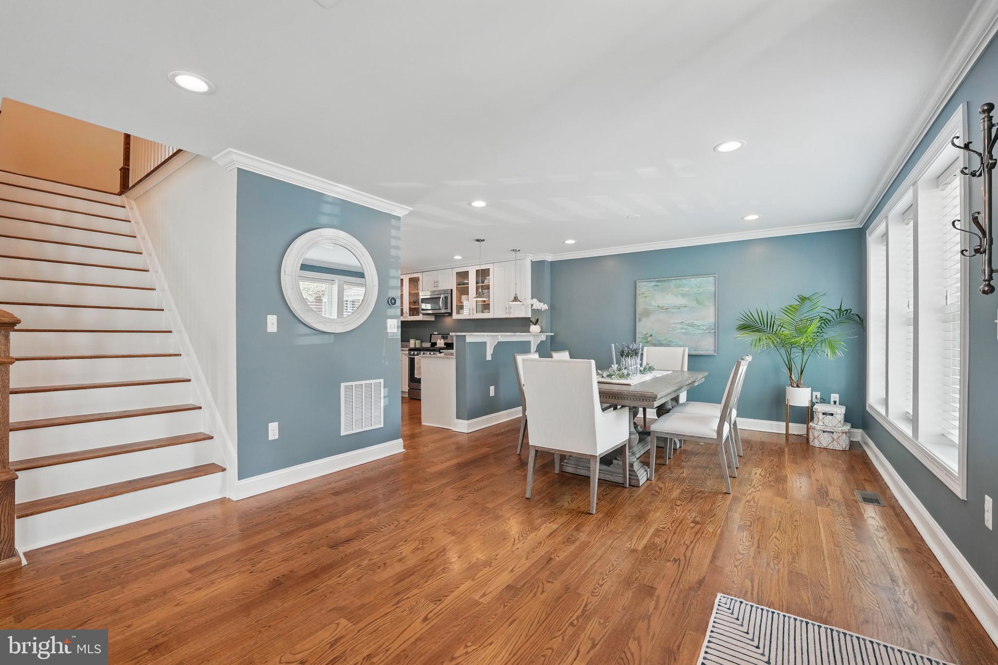 6930 27th Road North Arlington, VA 22213 - Photo 5 of 51 a view of a dining room with furniture window and wooden floor