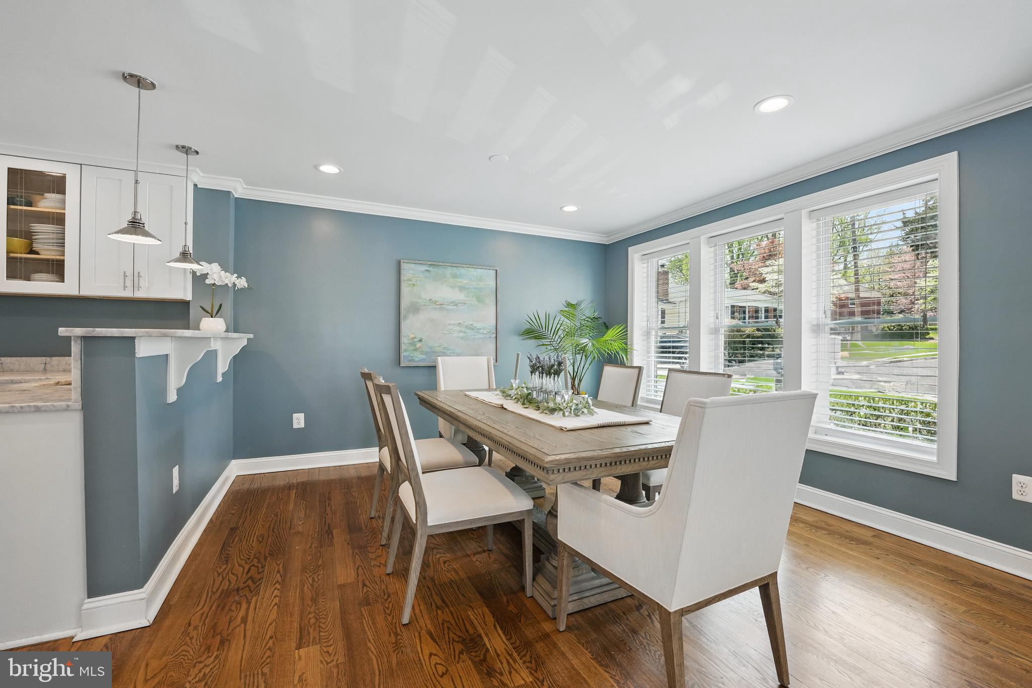 6930 27th Road North Arlington, VA 22213 - Photo 6 of 51 a view of a dining room with furniture window and wooden floor
