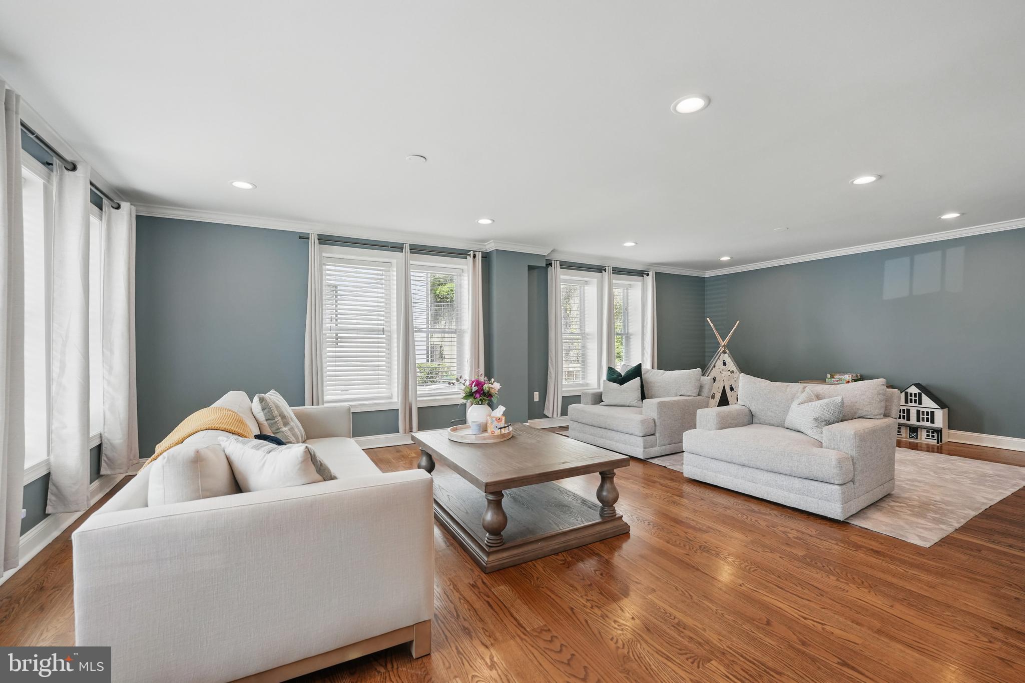 6930 27th Road North Arlington, VA 22213 - Photo 8 of 51 a living room with furniture and a large window