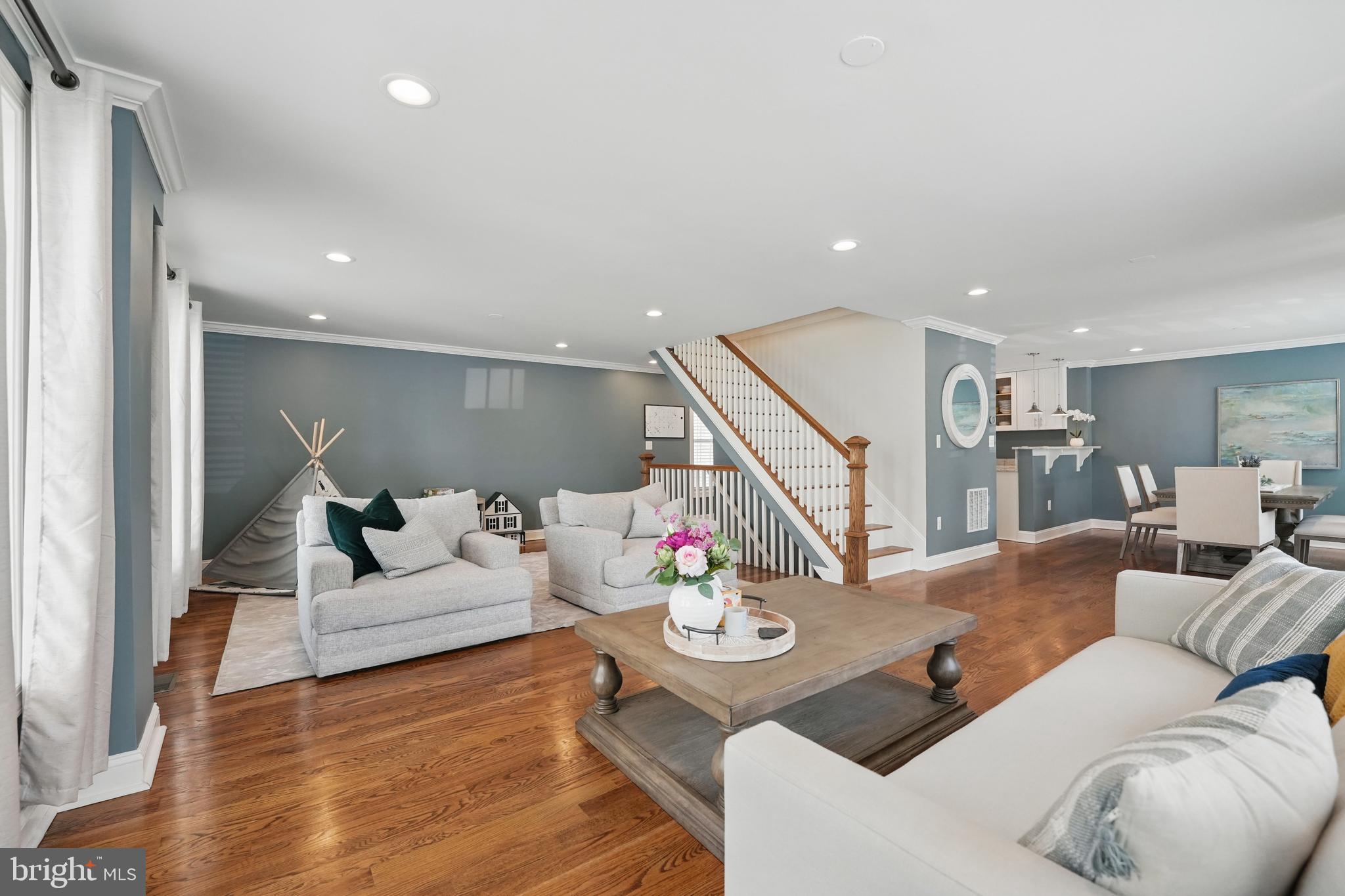 6930 27th Road North Arlington, VA 22213 - Photo 9 of 51 a living room with furniture and wooden floor