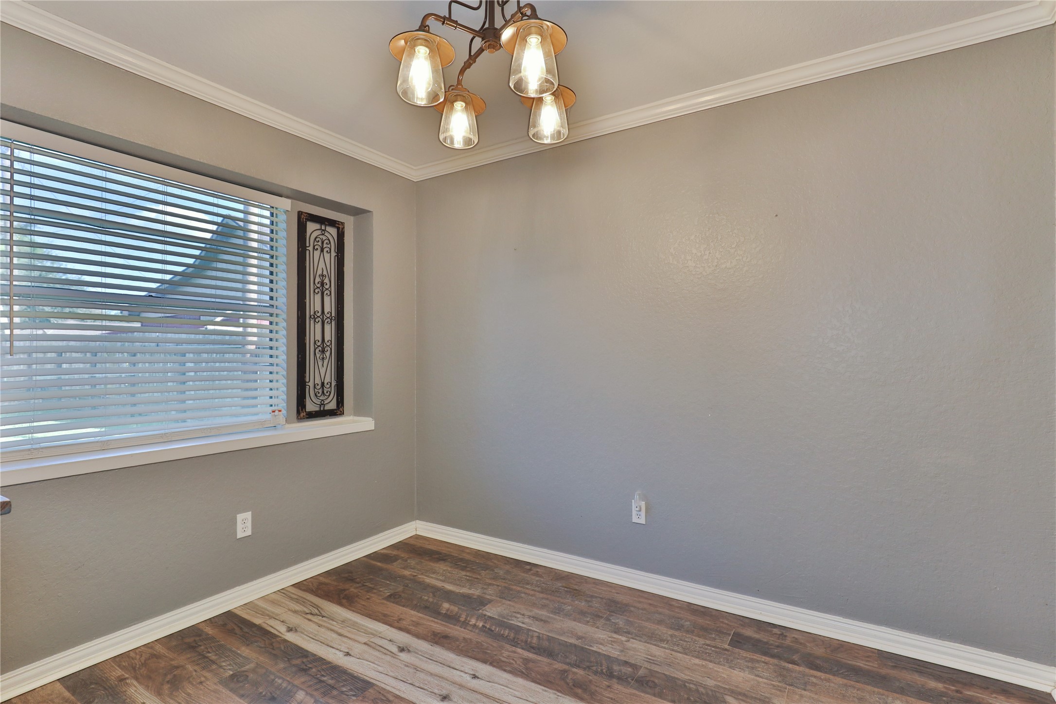 1 Shallowbrook Street Angleton, TX 77515 - Photo 13 of 30 a view of a room that has a window in it
