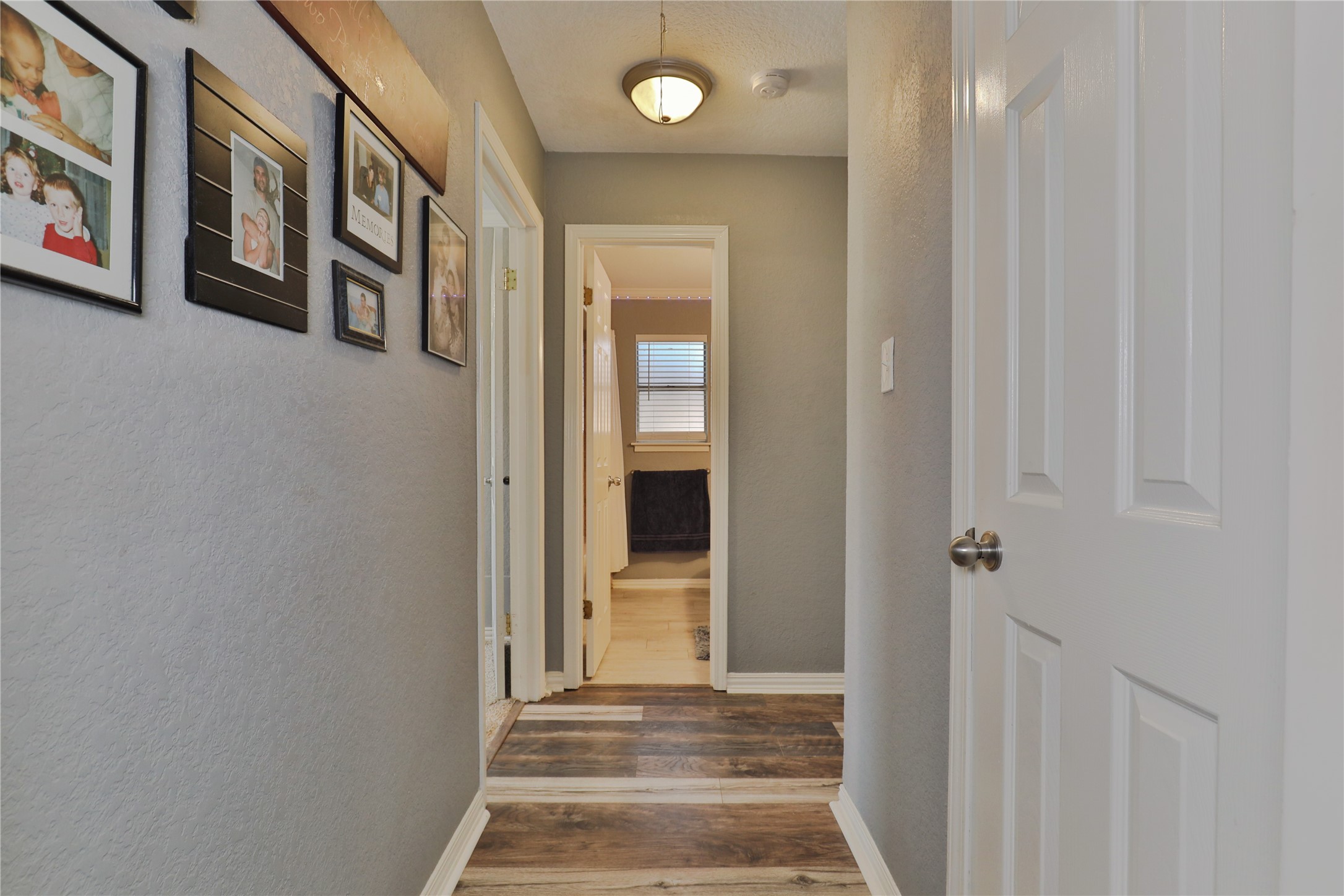 1 Shallowbrook Street Angleton, TX 77515 - Photo 18 of 30 a view of a hallway with entryway door