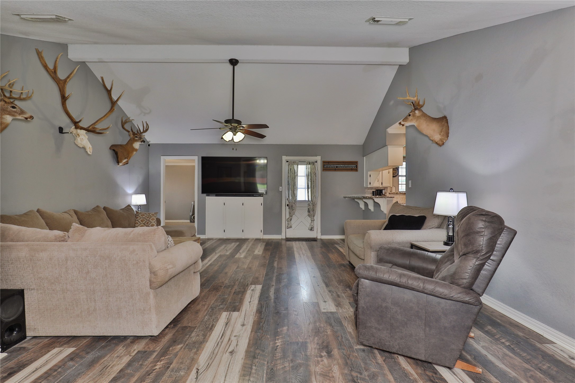 1 Shallowbrook Street Angleton, TX 77515 - Photo 6 of 30 a living room with furniture and a chandelier