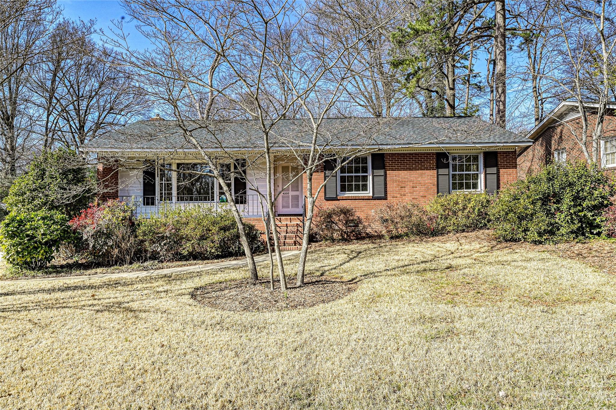4200 Murrayhill Road Charlotte, NC 28209 - Photo 1 of 29 front view of a house with a yard