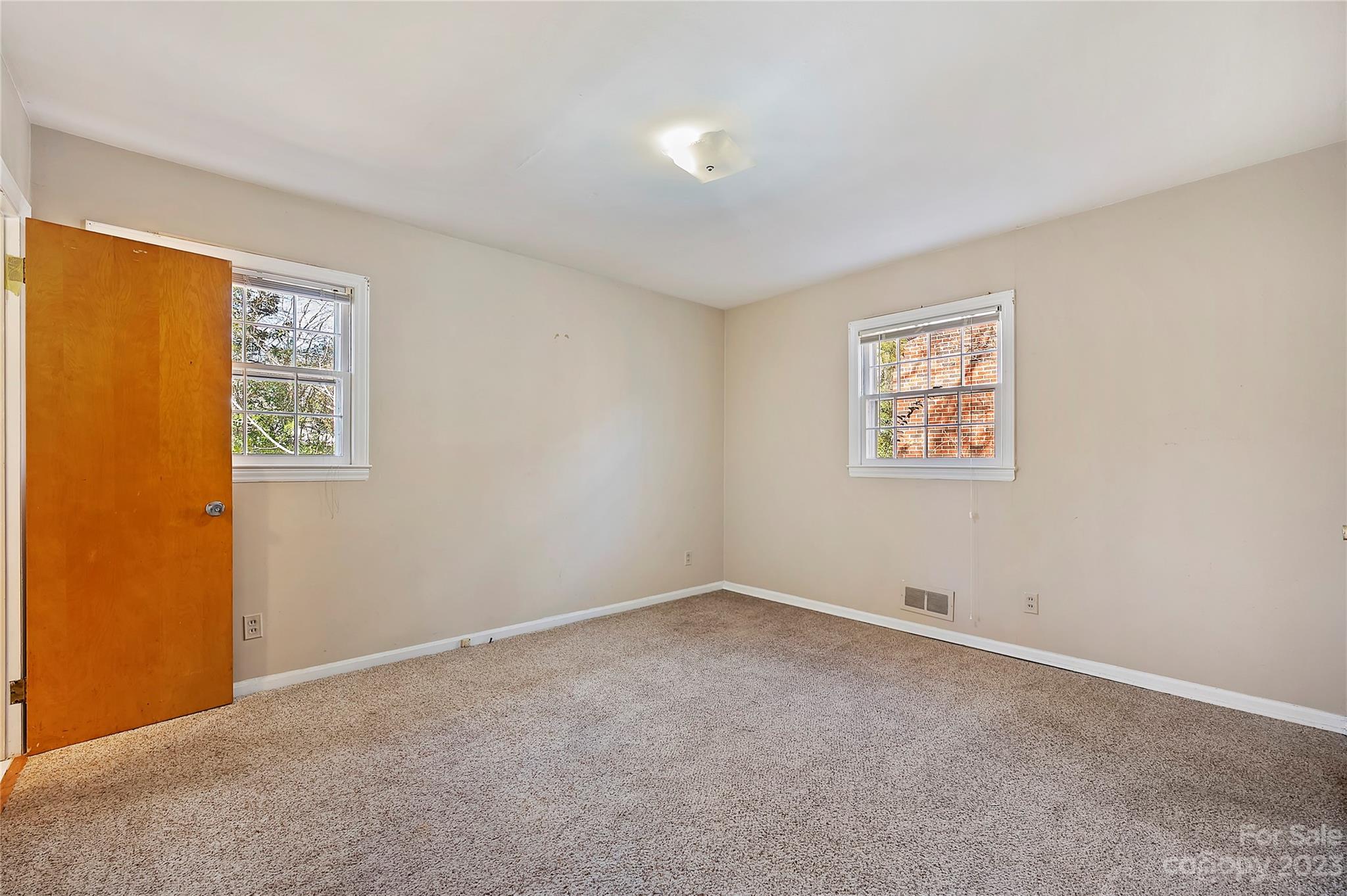 4200 Murrayhill Road Charlotte, NC 28209 - Photo 15 of 29 a view of an empty room with a window