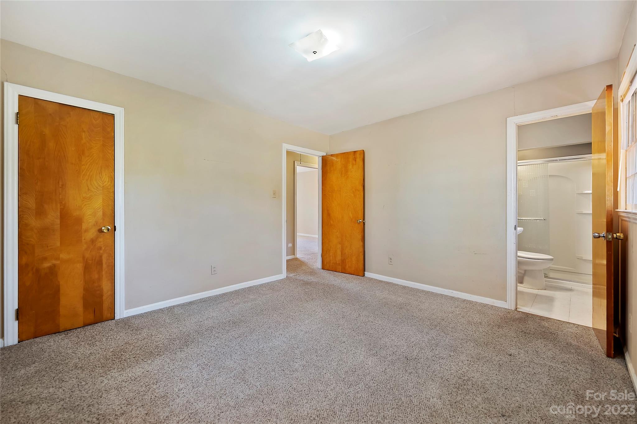 4200 Murrayhill Road Charlotte, NC 28209 - Photo 16 of 29 an empty room with closet and a yard