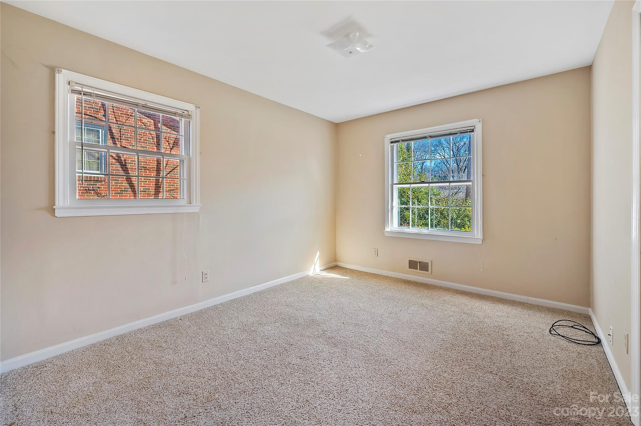 4200 Murrayhill Road Charlotte, NC 28209 - Photo 18 of 29 an empty room with windows