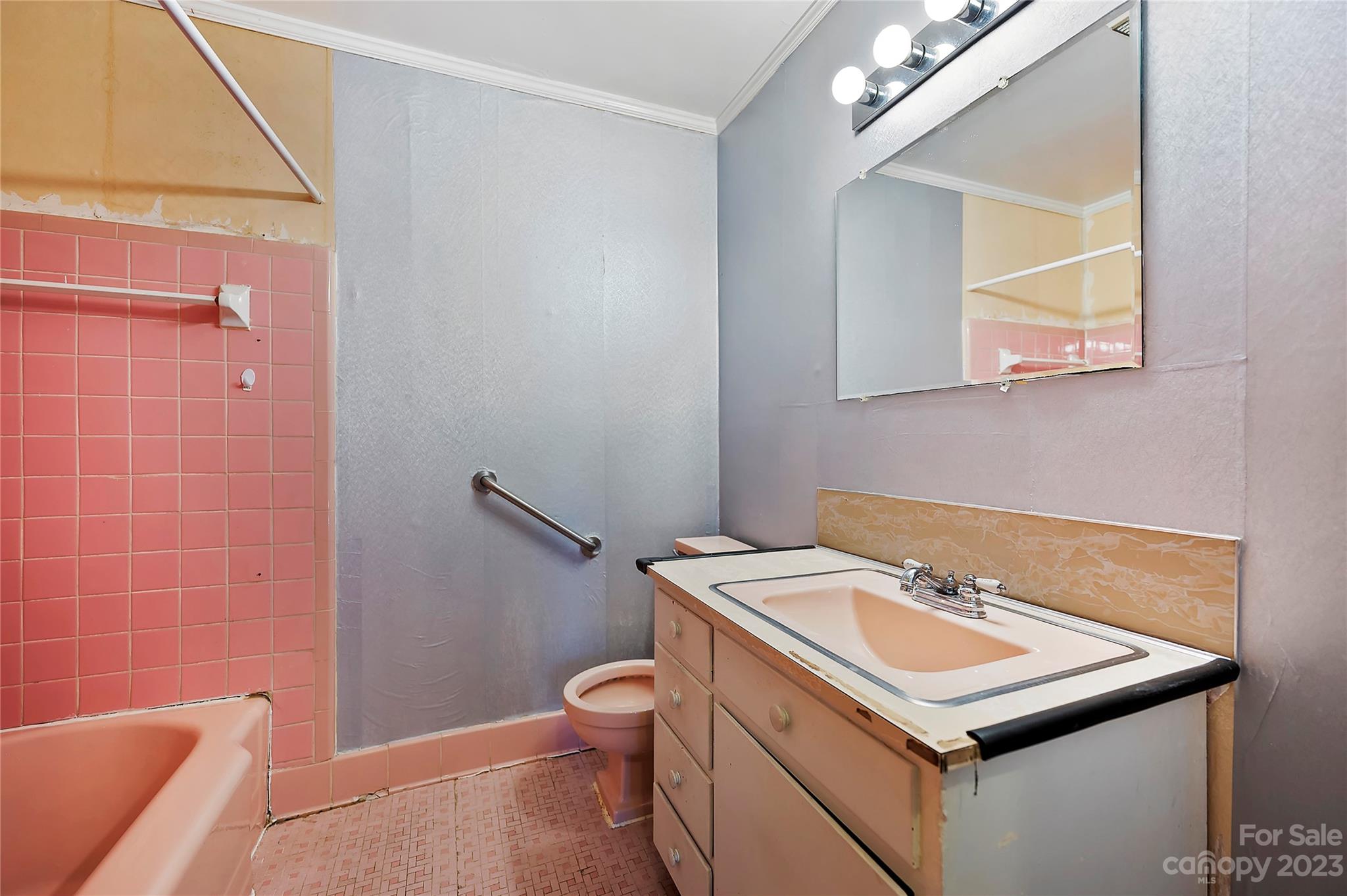 4200 Murrayhill Road Charlotte, NC 28209 - Photo 19 of 29 a bathroom with a sink a toilet and a mirror