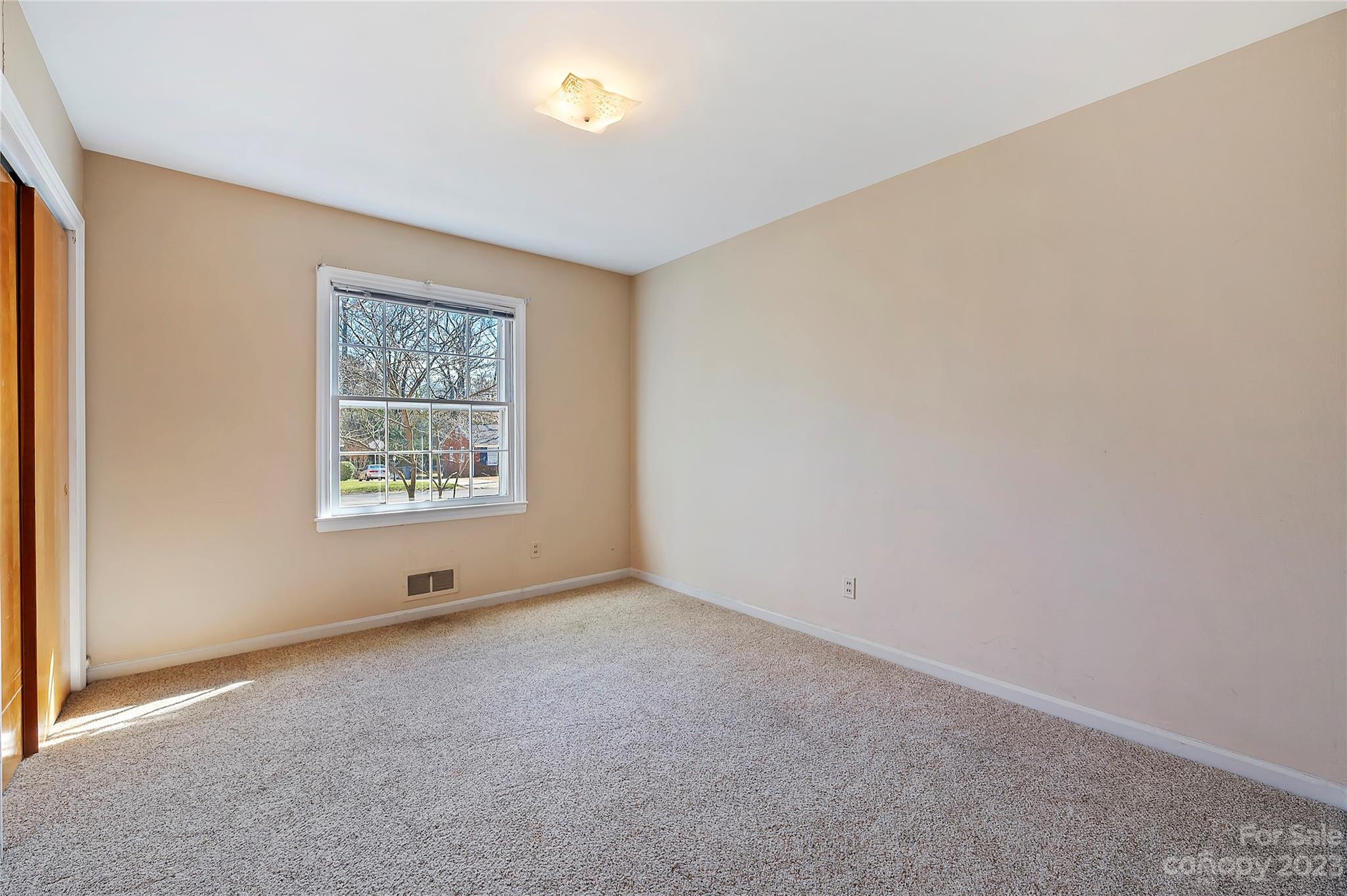4200 Murrayhill Road Charlotte, NC 28209 - Photo 20 of 29 an empty room with windows