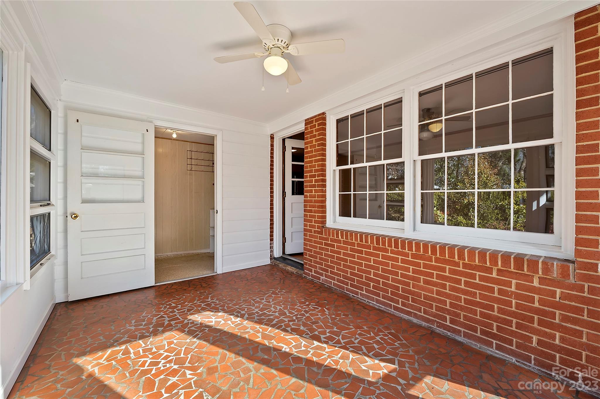 4200 Murrayhill Road Charlotte, NC 28209 - Photo 21 of 29 a view of front door with wooden floor and windows