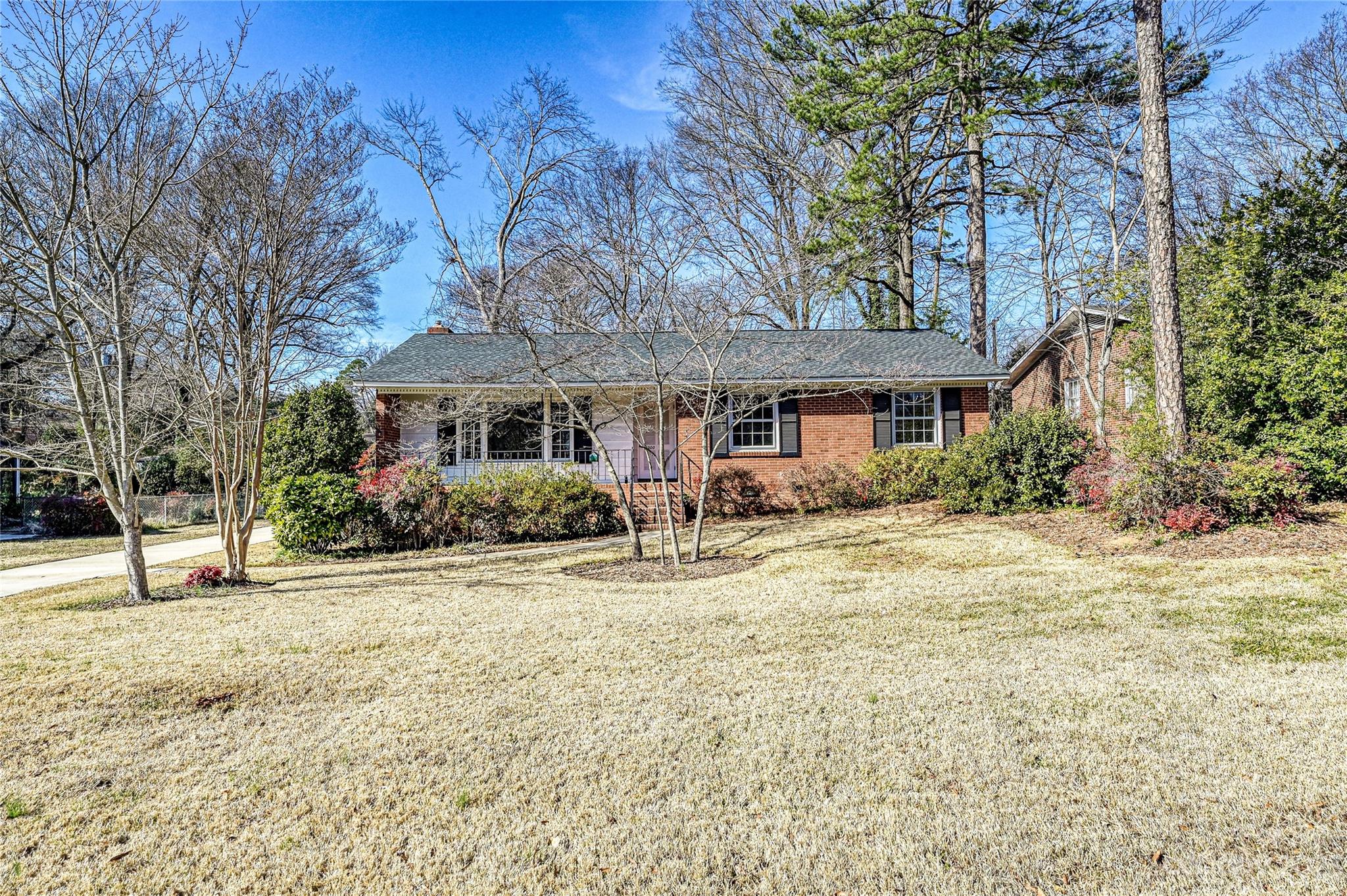4200 Murrayhill Road Charlotte, NC 28209 - Photo 29 of 29 a house with trees in the background