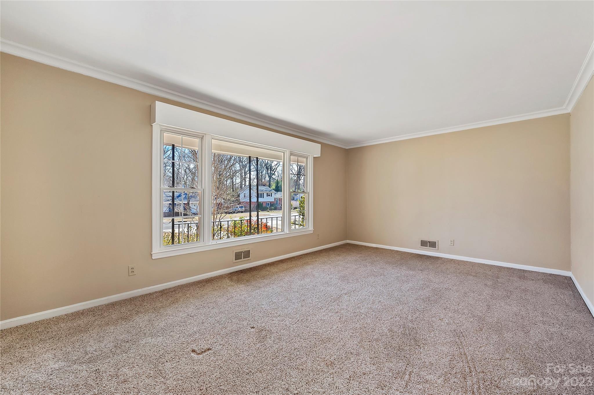 4200 Murrayhill Road Charlotte, NC 28209 - Photo 5 of 29 a view of an empty room with a window