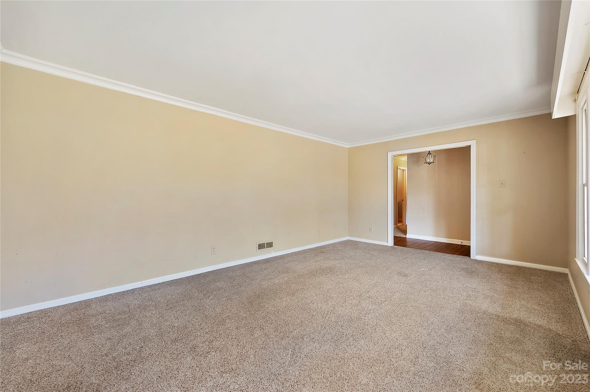 4200 Murrayhill Road Charlotte, NC 28209 - Photo 7 of 29 an empty room with a natural light