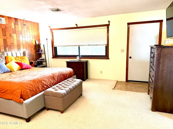 a swimming pool that is in a backyard