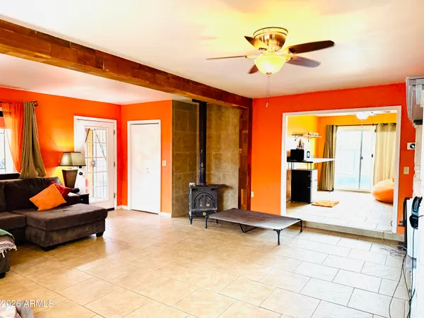 a kitchen with stainless steel appliances a stove a refrigerator and a sink
