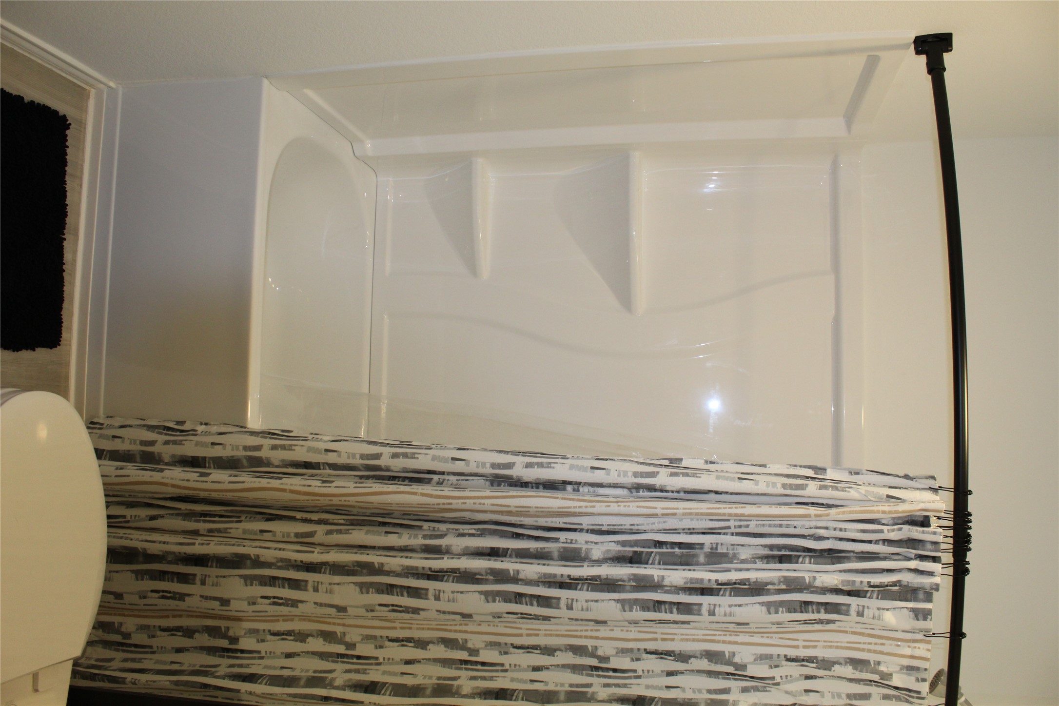205 Marty Allen Loop Jarrell, TX 76537 - Photo 17 of 22 Bathroom with shower / tub combo with curtain and toilet