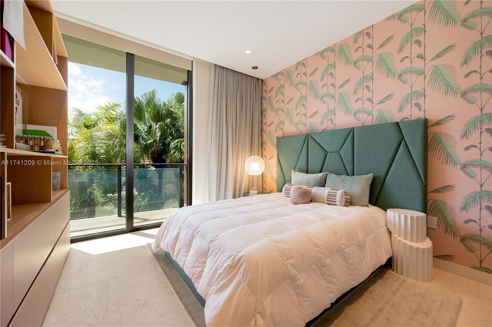 3581 East Glencoe Street, Unit 301 Miami, FL 33133 - Photo 17 of 21 a bedroom with a bed and a view of balcony