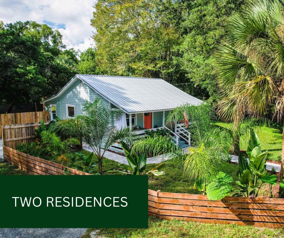 635 Madeore Street St. Augustine, FL 32084 - Photo 2 of 44 a view of a house with a yard plants and large tree
