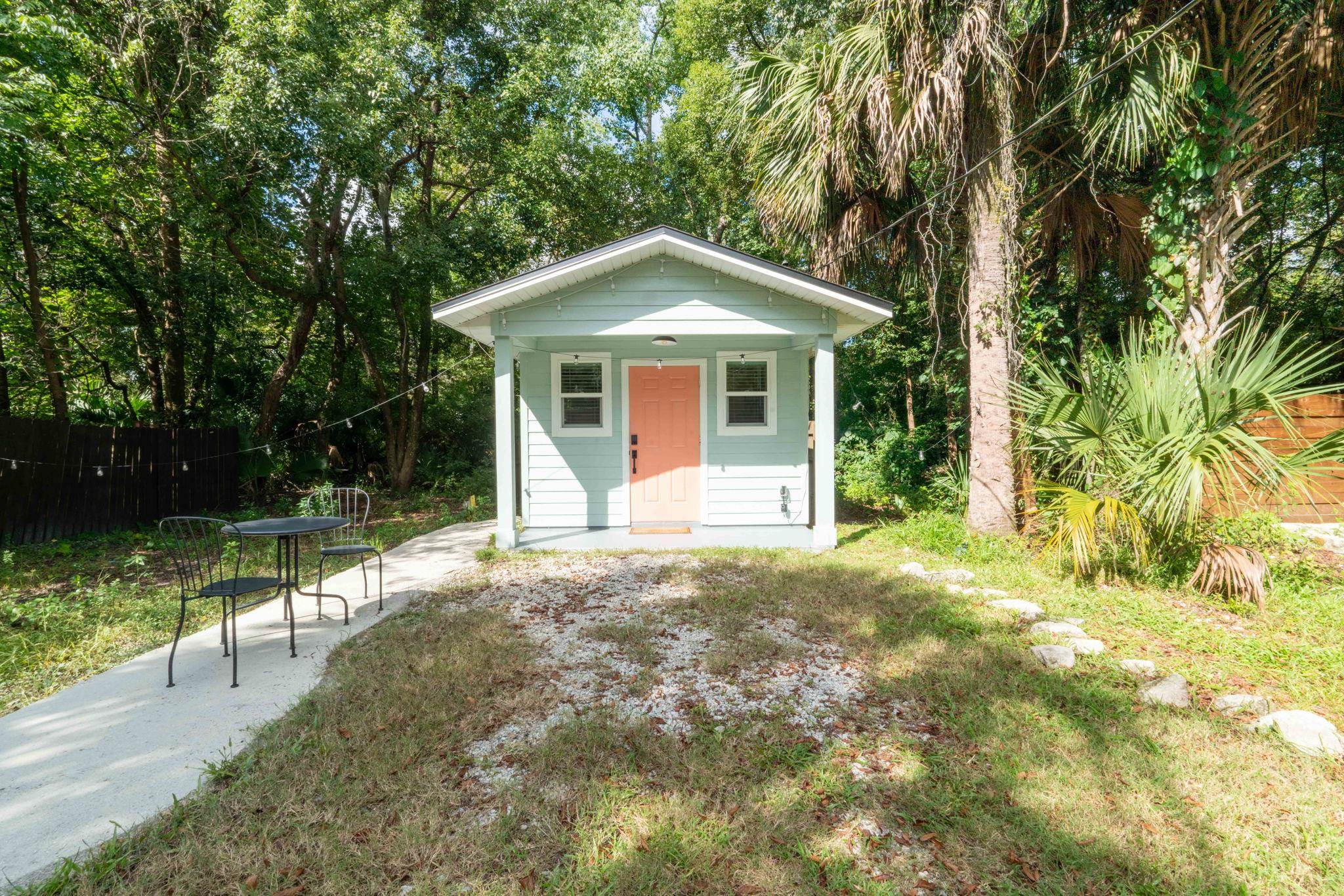 635 Madeore Street St. Augustine, FL 32084 - Photo 24 of 44 a front view of a house with yard and green space