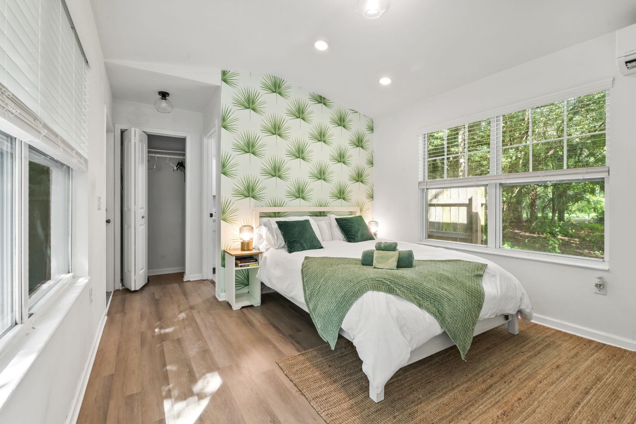 635 Madeore Street St. Augustine, FL 32084 - Photo 27 of 44 a bed sitting in a spacious bedroom next to a window