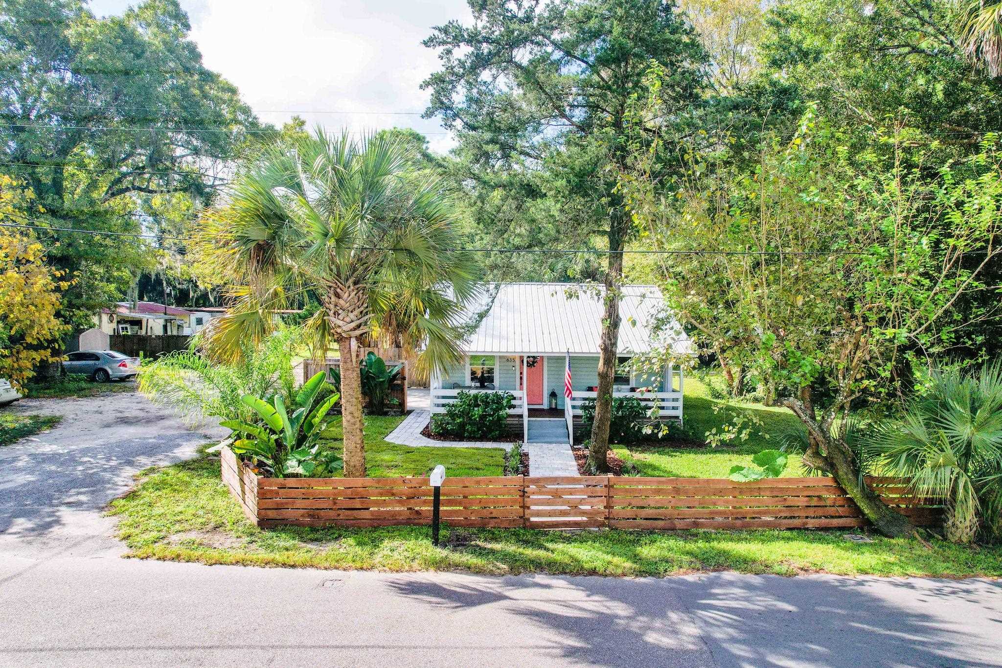 635 Madeore Street St. Augustine, FL 32084 - Photo 34 of 44 a front view of a house with garden