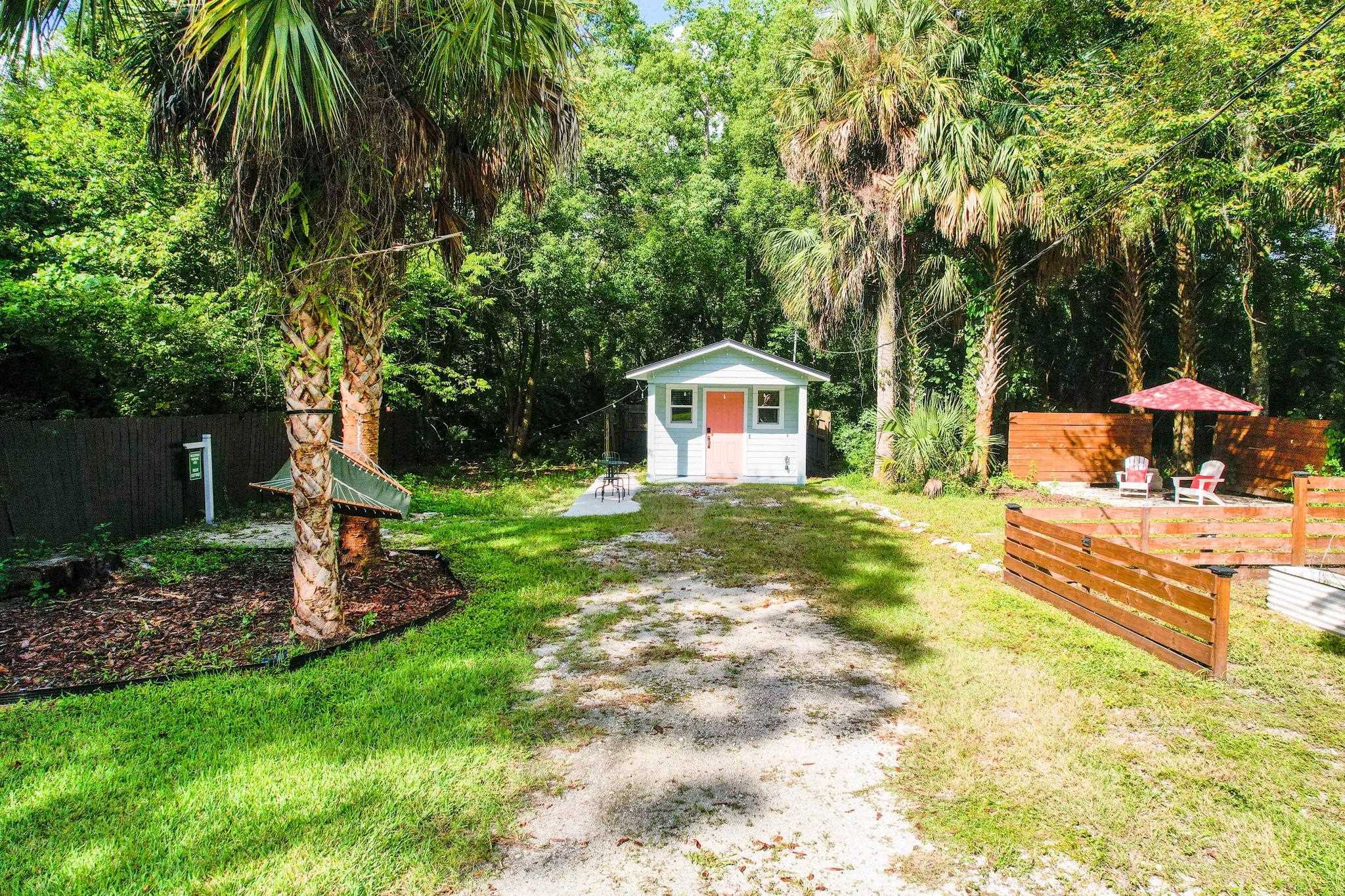635 Madeore Street St. Augustine, FL 32084 - Photo 35 of 44 a view of a house with backyard and sitting area