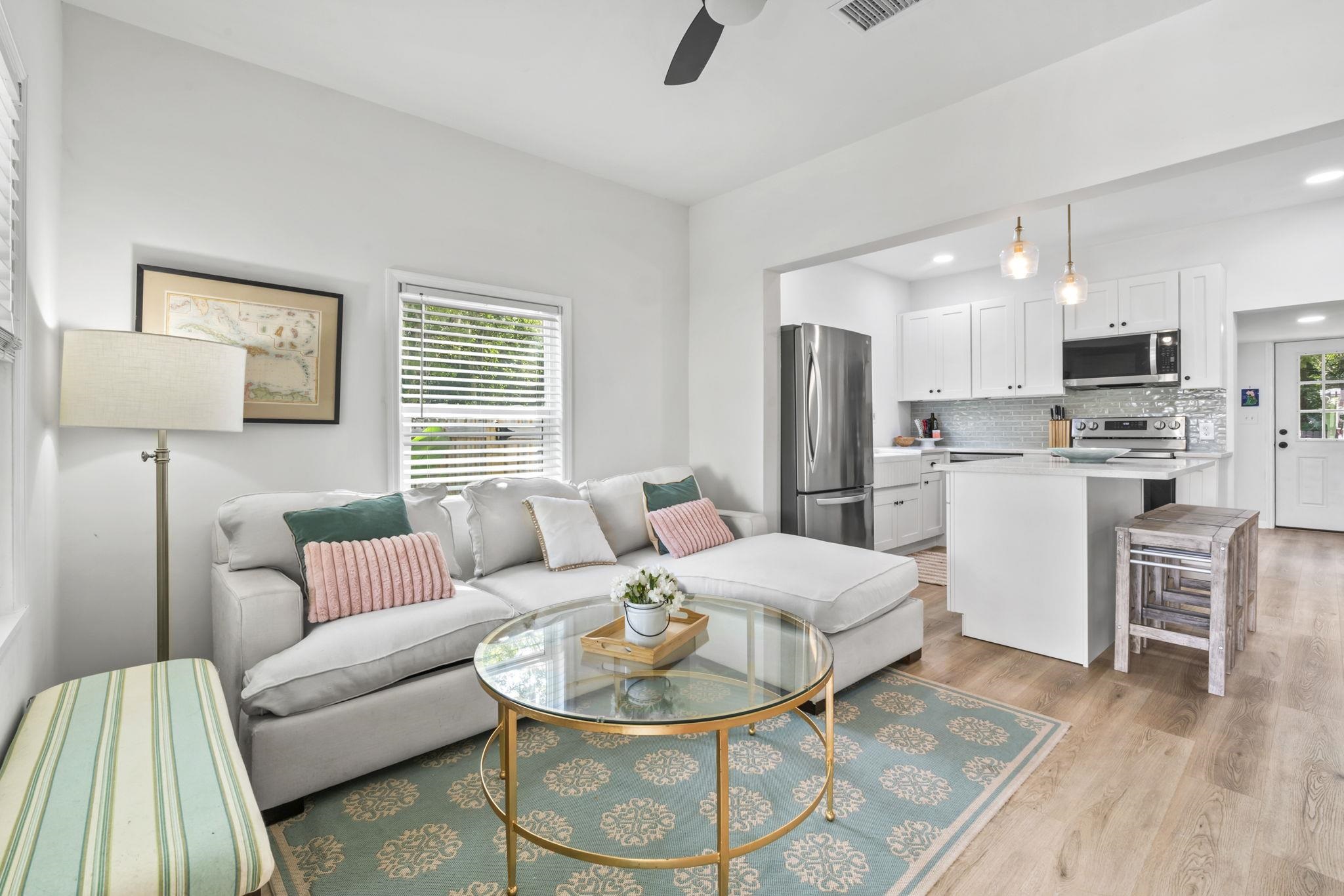 635 Madeore Street St. Augustine, FL 32084 - Photo 10 of 44 a living room with stainless steel appliances furniture and a table