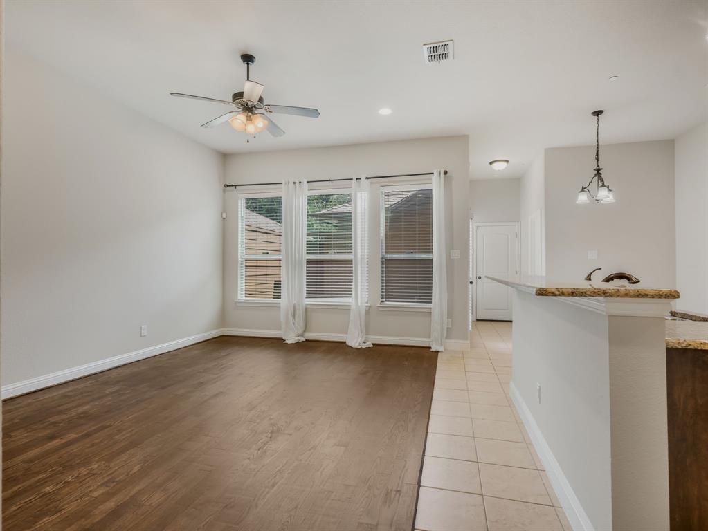 4672 Cecile Road Plano, TX 75024 - Photo 15 of 31 wooden floor in an empty room with a window