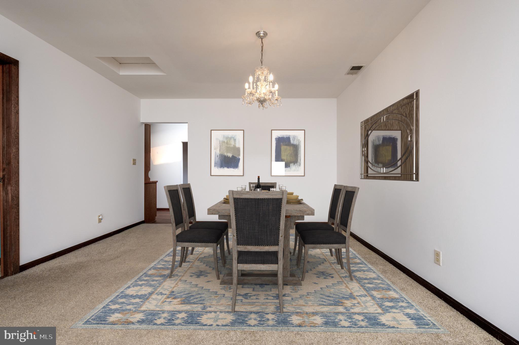8236 Bayside Road Chesapeake Beach, MD 20732 - Photo 13 of 39 a view of a dining room with furniture