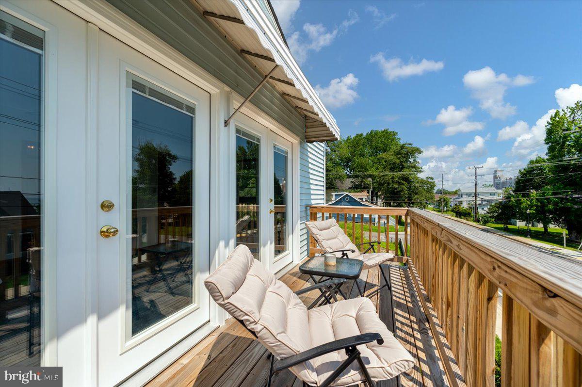 8236 Bayside Road Chesapeake Beach, MD 20732 - Photo 24 of 39 a view of balcony with furniture