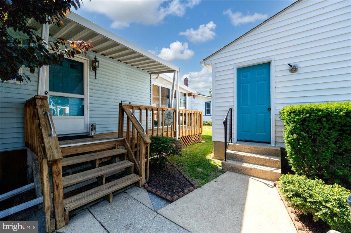 8236 Bayside Road Chesapeake Beach, MD 20732 - Photo 33 of 39 a view of backyard with sitting area