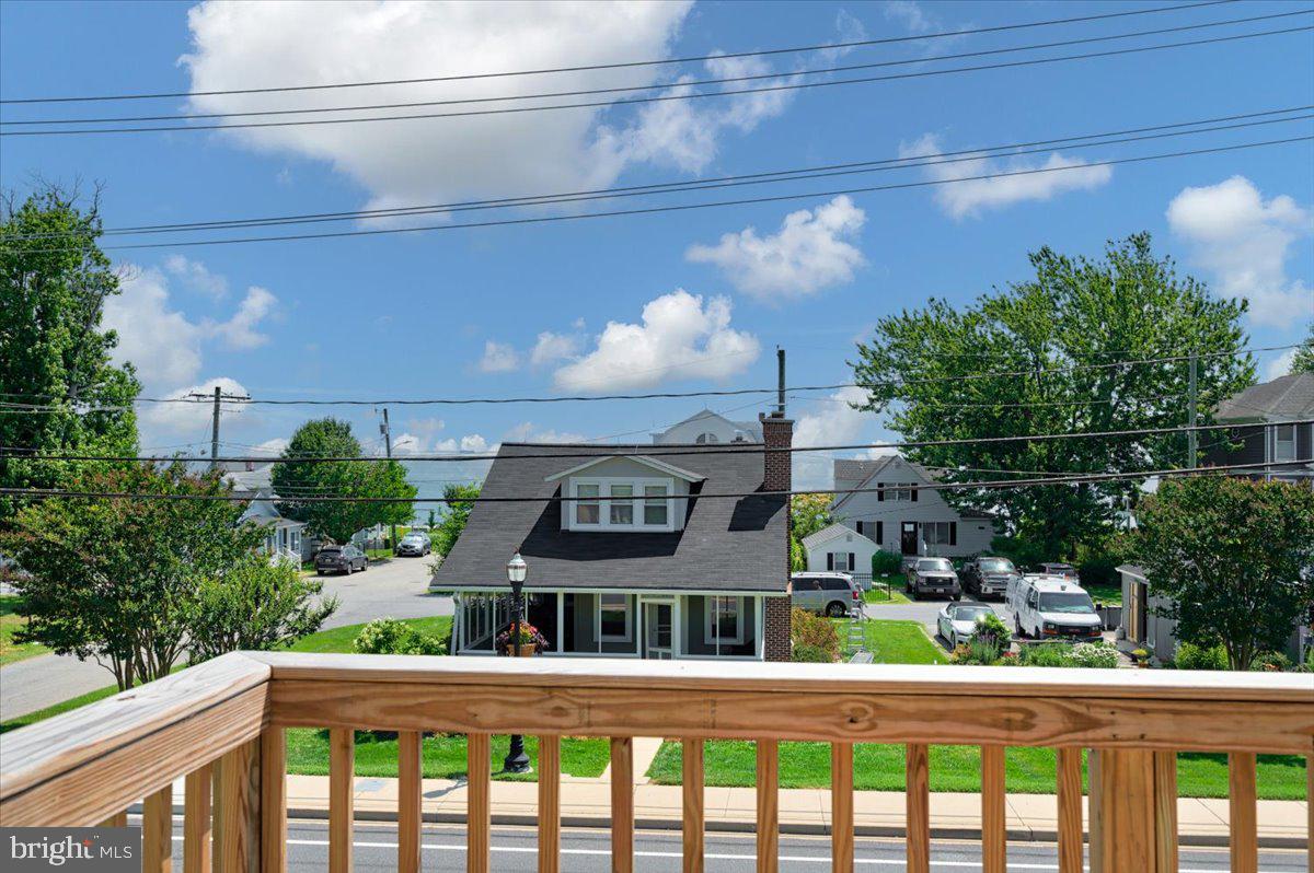 8236 Bayside Road Chesapeake Beach, MD 20732 - Photo 4 of 39 a balcony view with a garden space