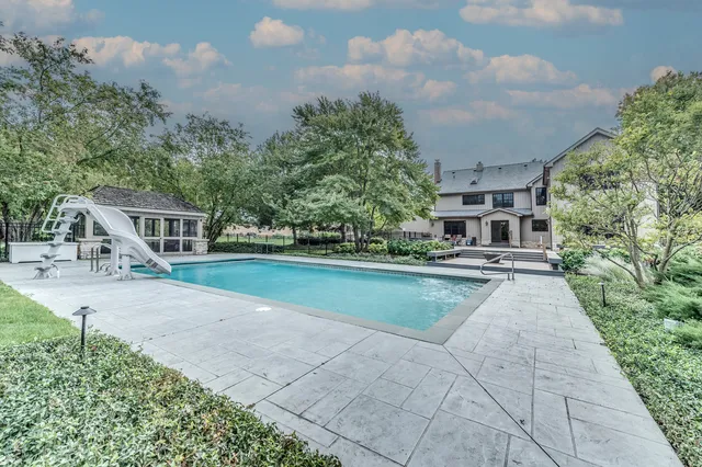 a view of house with garden