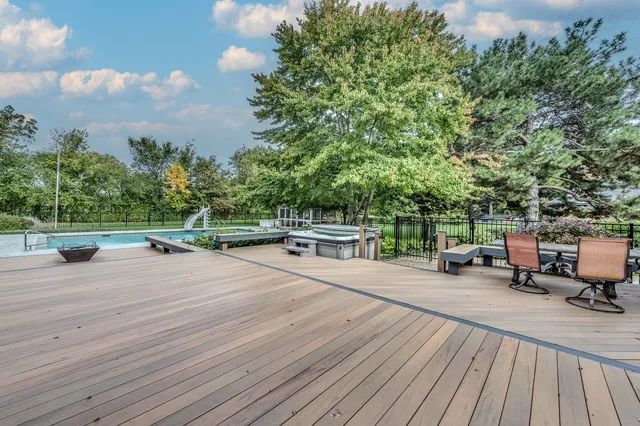 an aerial view of residential house with outdoor space and street view