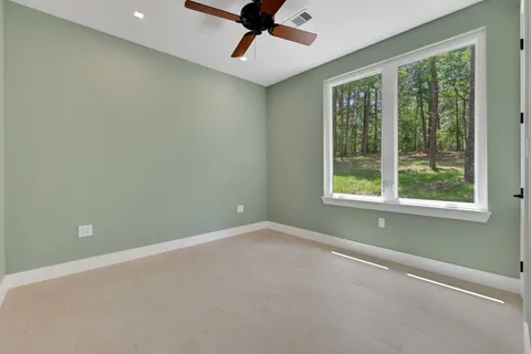 a kitchen with a refrigerator and window
