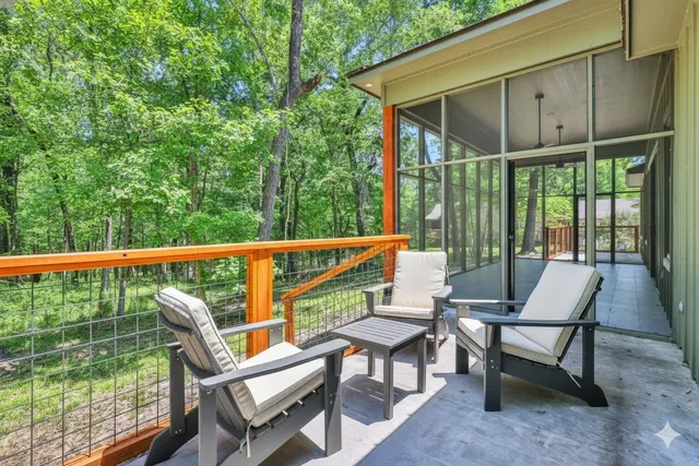 a backyard of a house with portable swimming pool and outdoor seating