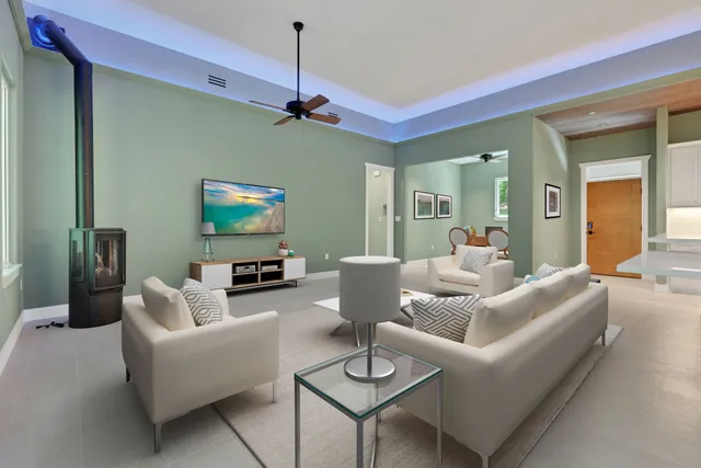 an empty room with a kitchen and a sink