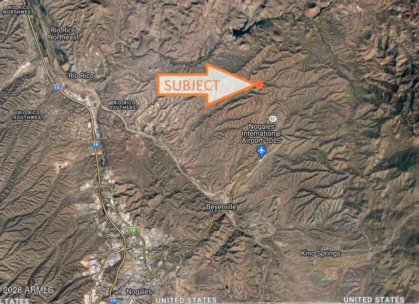 a street sign on a tree in the background