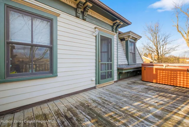 a bedroom with a bed and a table in it