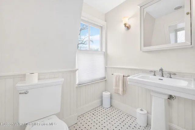 a kitchen with stainless steel appliances granite countertop a sink and a stove