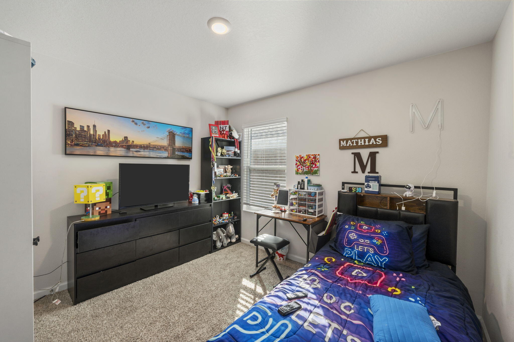 4735 Airmen Drive Crestview, FL 32539 - Photo 14 of 29 a living room with furniture and a flat screen tv