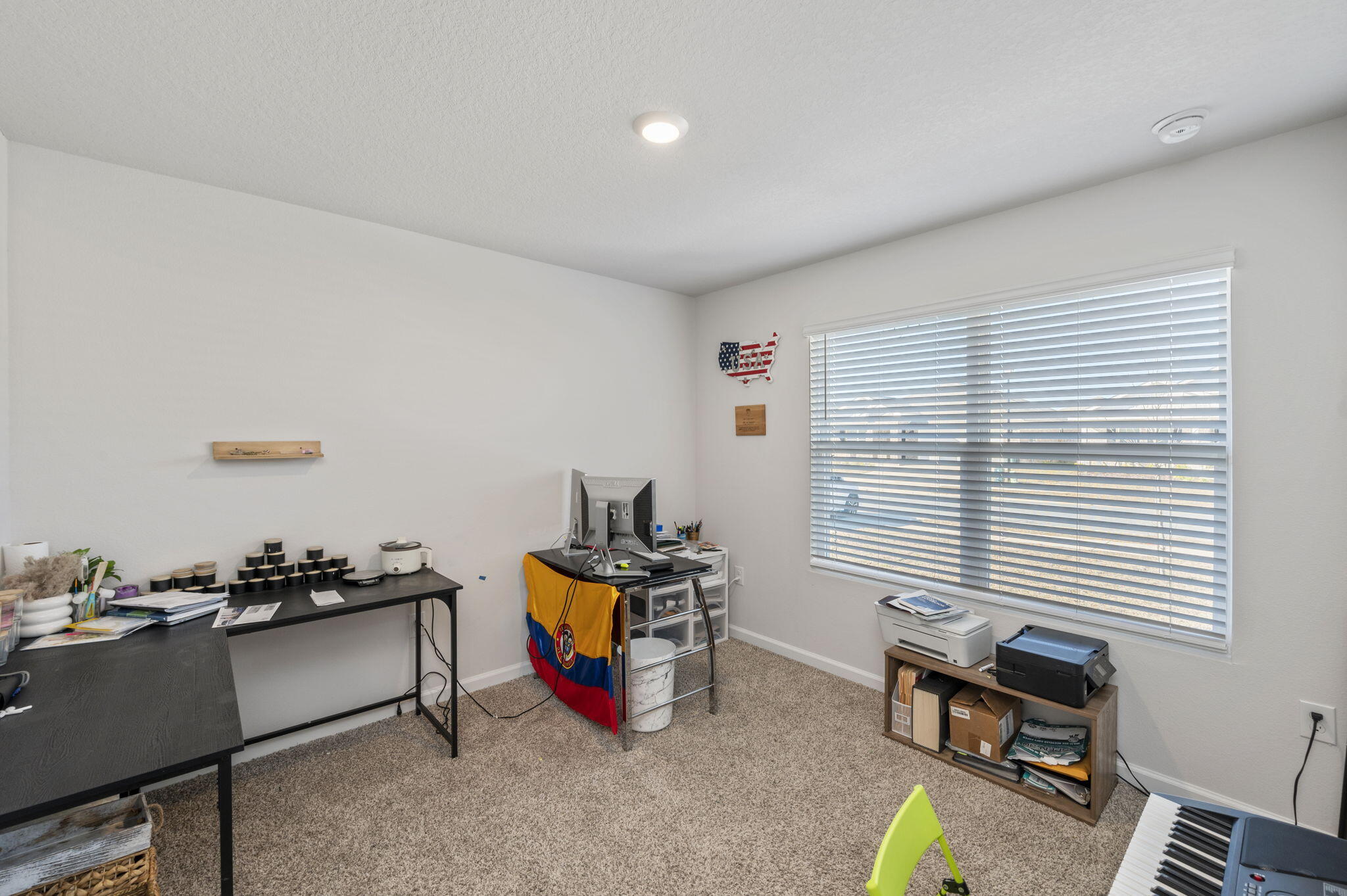 4735 Airmen Drive Crestview, FL 32539 - Photo 16 of 29 a room with furniture and musical instruments
