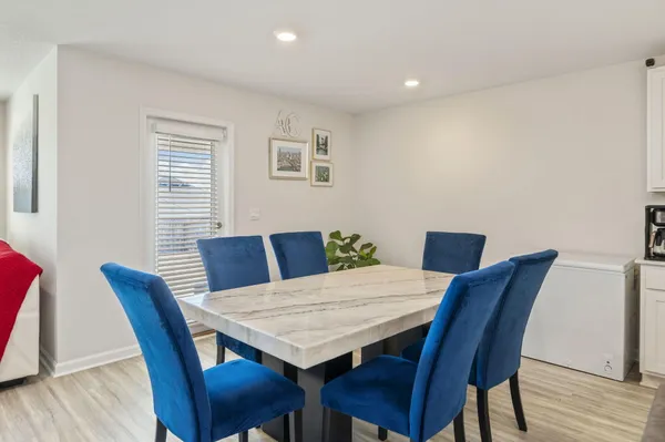 a view of a dining room with furniture