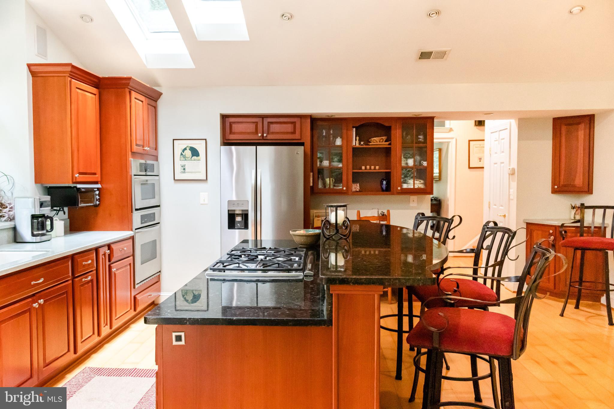 5100 Gunpowder Road Fairfax, VA 22030 - Photo 26 of 39 Gourmet Kitchen with Island and Breakfast Bar