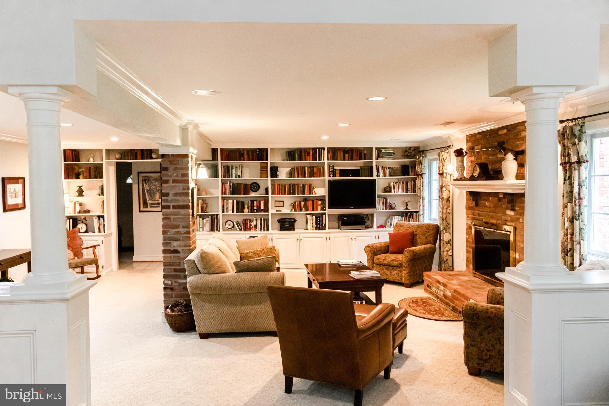 5100 Gunpowder Road Fairfax, VA 22030 - Photo 28 of 39 Columns invite you to the Step Down Family Room