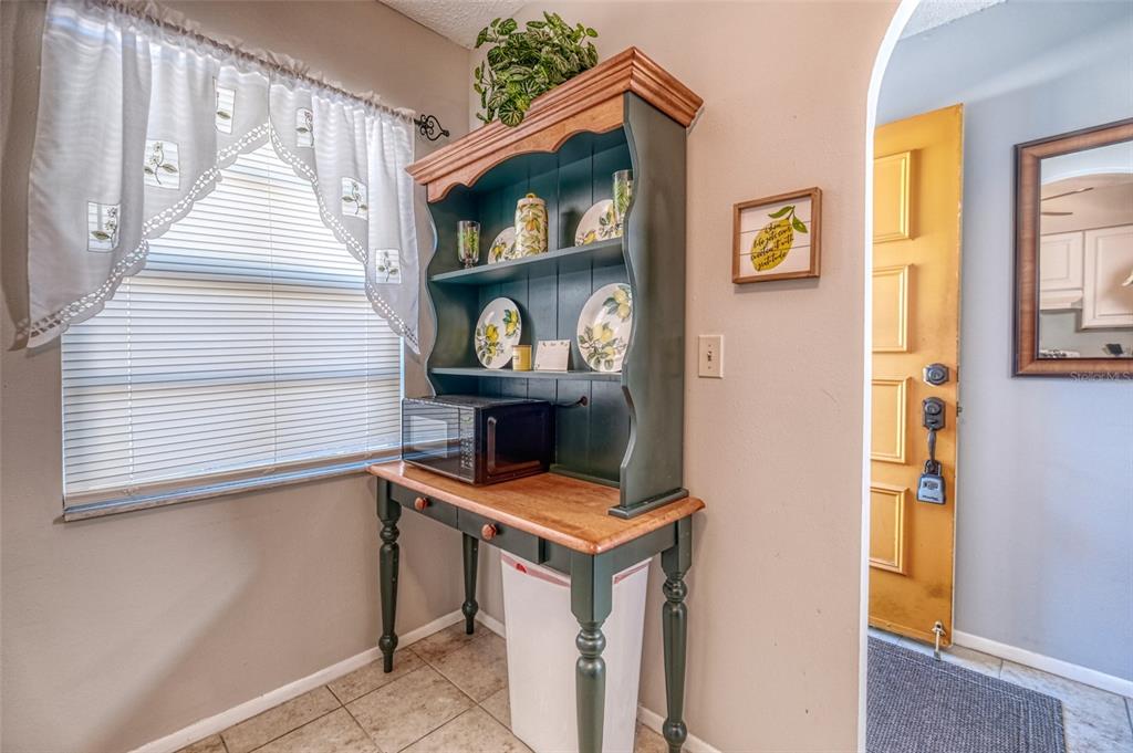13714 Mission Oaks Boulevard, Unit 13714 Seminole, FL 33776 - Photo 11 of 24 a view of storage and utility room